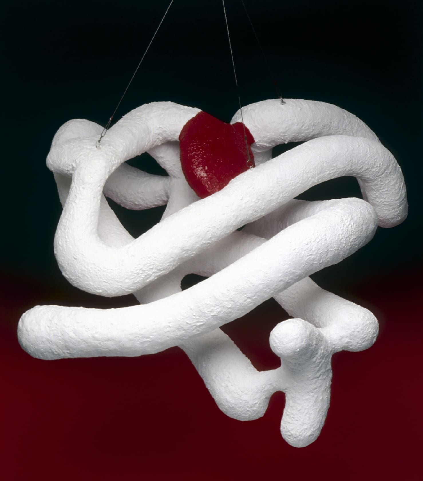 white and red scientific structure against a black background.