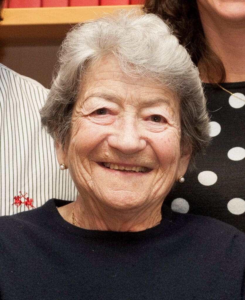 Headshot of elderly woman smiling