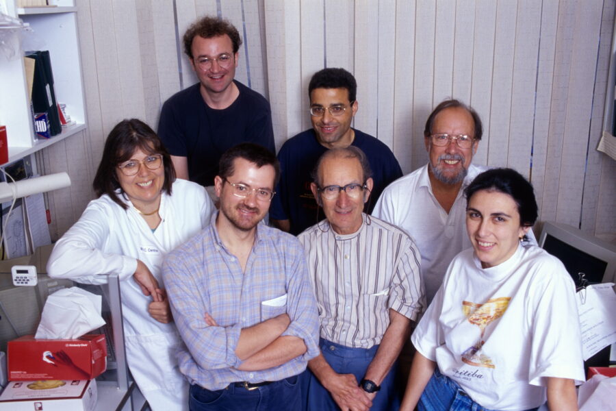 Group of seven people in a laboratory.