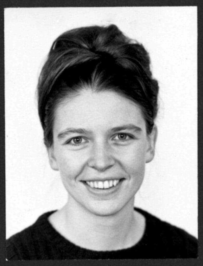 Black and white photograph of a woman facing the camera