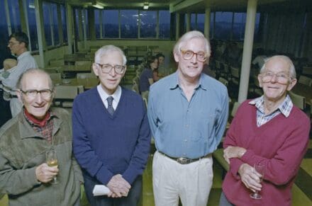 César Milstein, Aaron Klug, John Walker and Fred Sanger stood in the LMB canteen