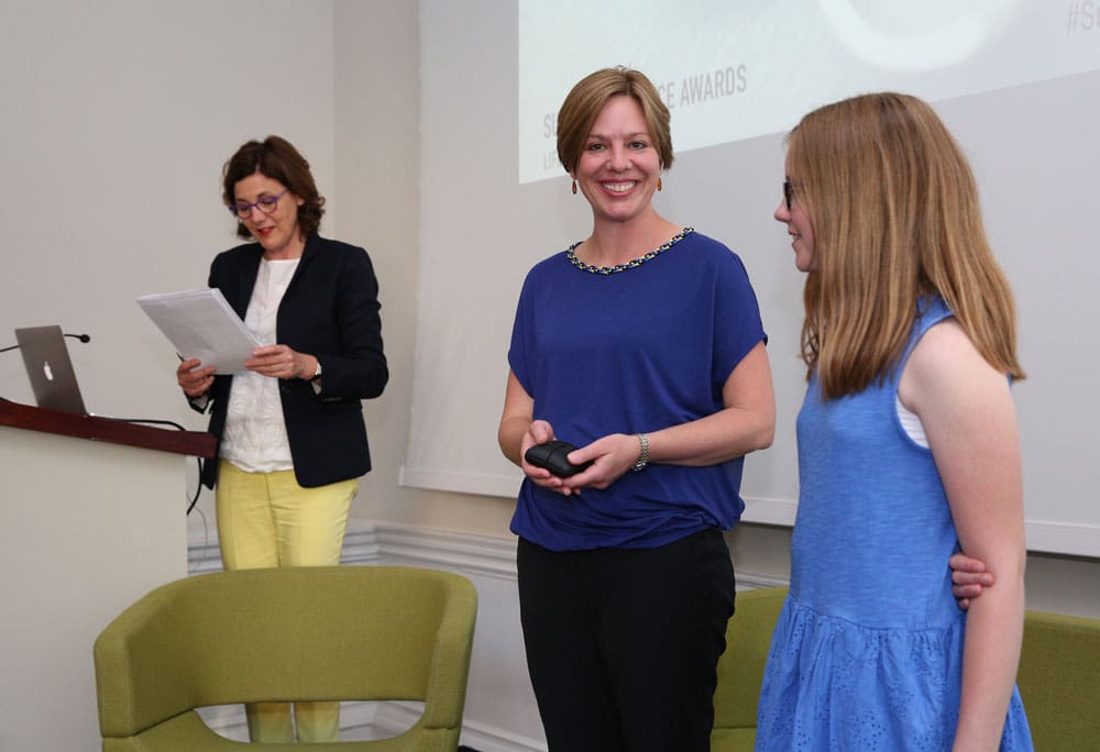 Lori handing on her heirloom