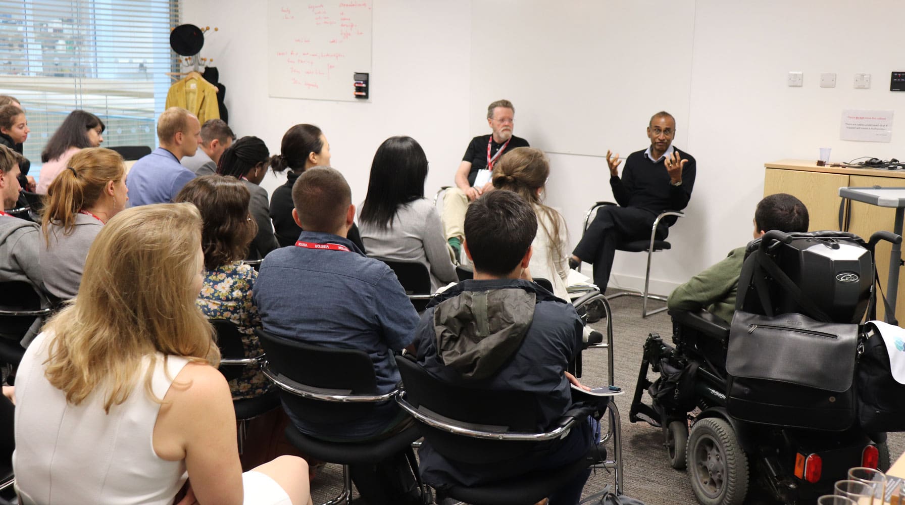 Schmidt Science Fellows attending a discussion