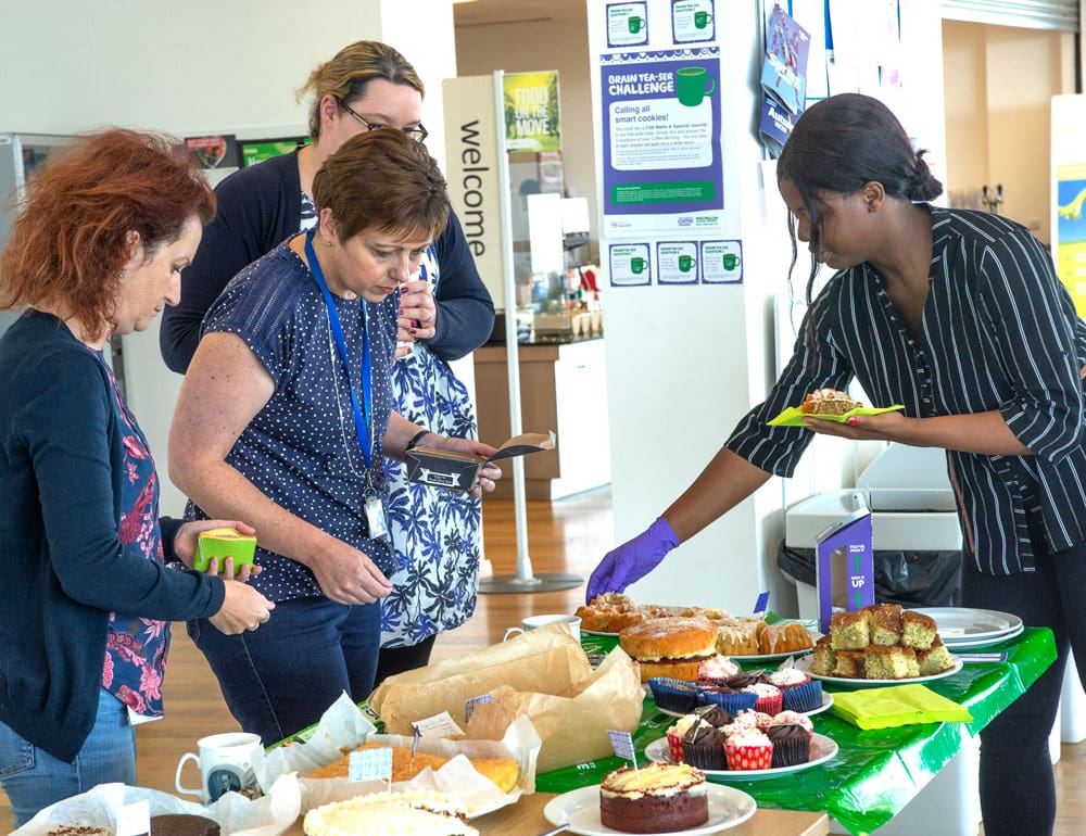 LMB staff lines up for the bake sale
