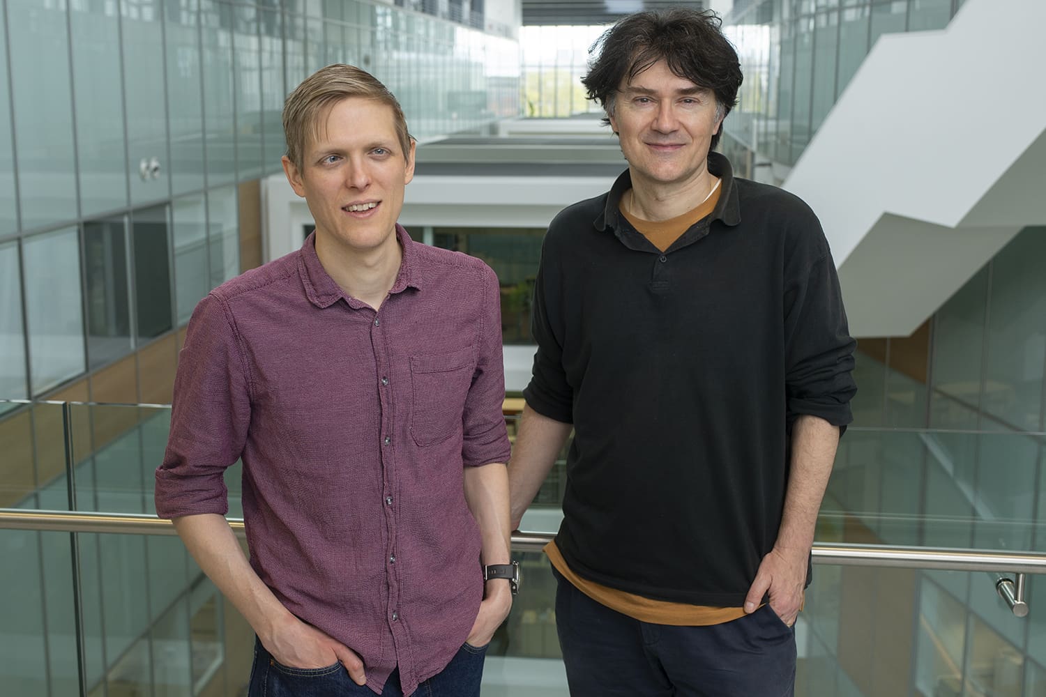 Photo of Ben Porebski and Philipp Holliger in the LMB atrium. 
