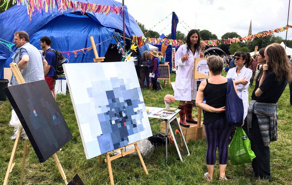 Nicola Smyllie talking to visitors at Strawberry Fair. Image courtesy of Nicola Smyllie.