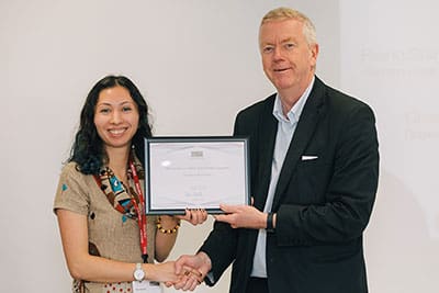 Nicola Smyllie receiving award from John Savill