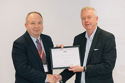 Richard Pannell receiving award from John Savill