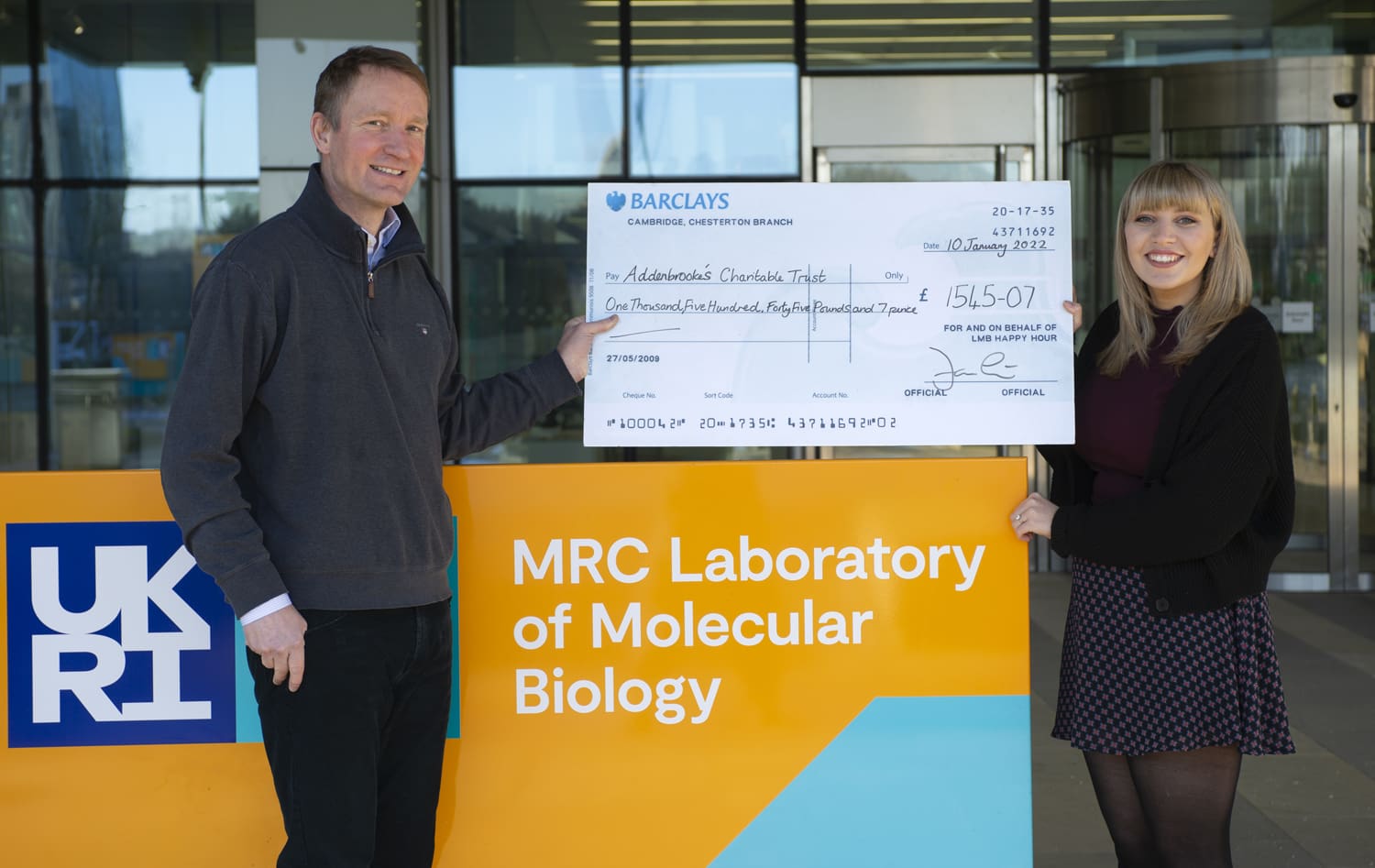 Donation cheque handover